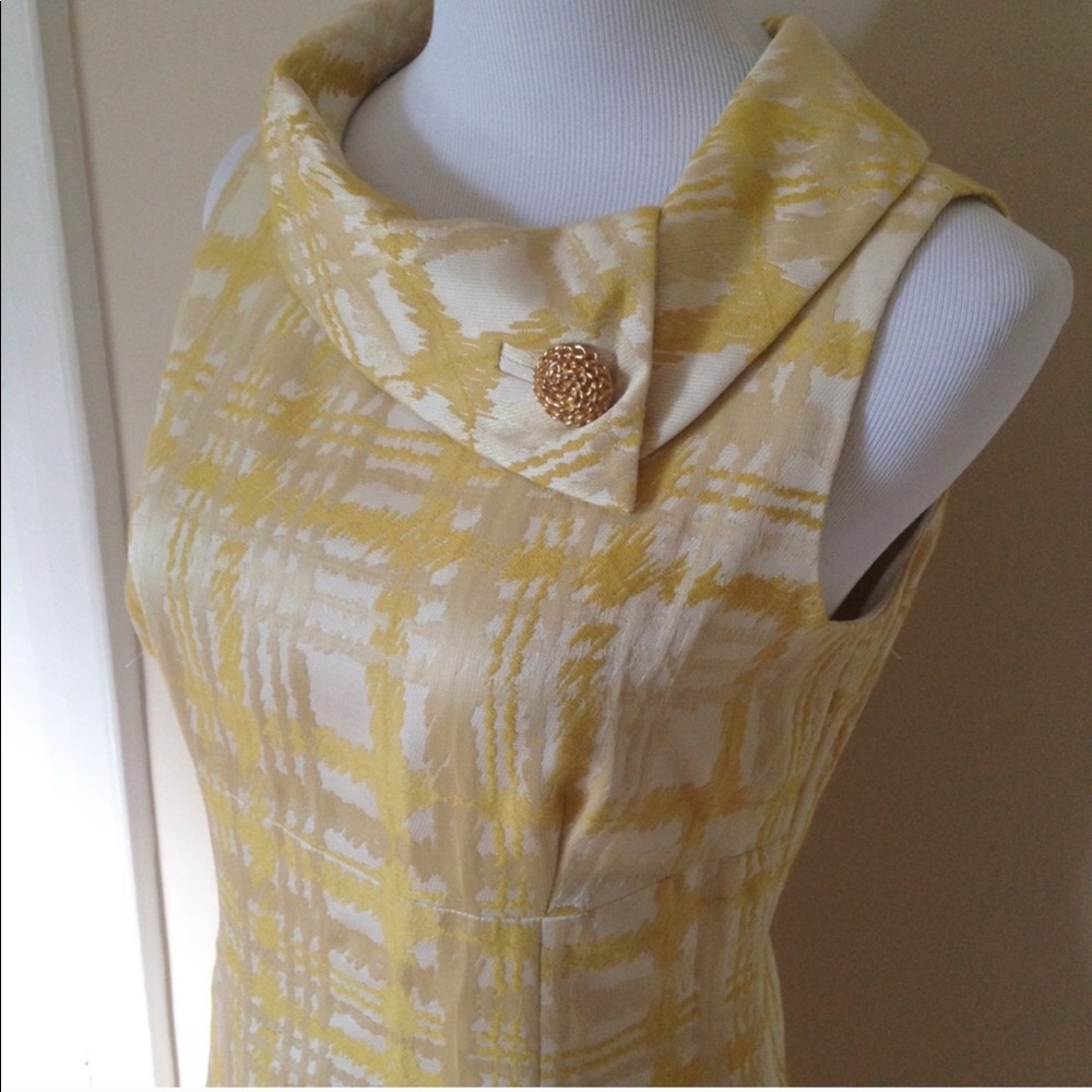 Vintage inspired sheath dress with jeweled brooch